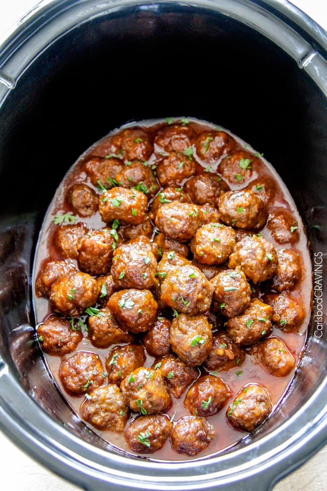 Tender juicy slow cooker Honey Buffalo Meatballs simmered in the most tantalizing sweet heat sauce that everyone goes crazy for! Perfect appetizer or delicious, easy meal with rice!