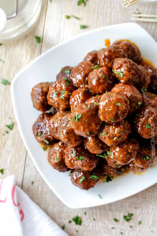top view of slow cooker buffalo meatballs stacked on a platter