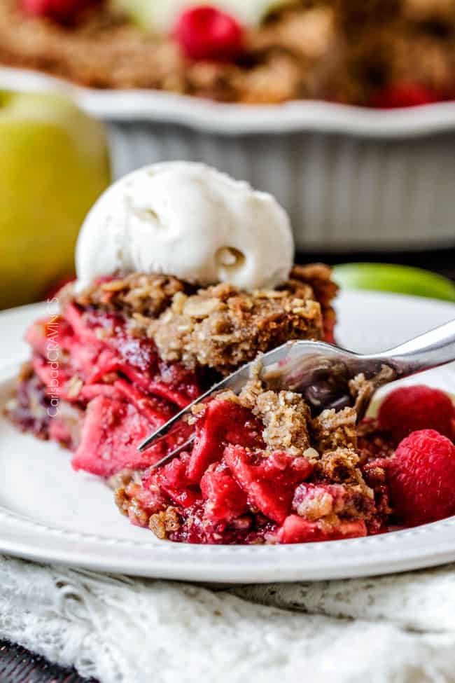 Easy Raspberry Apple Pie with Oatmeal Cookie Crumble Topping is an amazinlgy delicious twist on classic apple pie that everyone will go crazy for! I could eat the crust, filling or topping alone - every part is so good!