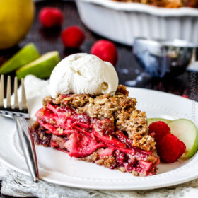 Easy Raspberry Apple Pie with Oatmeal Cookie Crumble Topping is an amazinlgy delicious twist on classic apple pie that everyone will go crazy for! I could eat the crust, filling or topping alone - every part is so good!