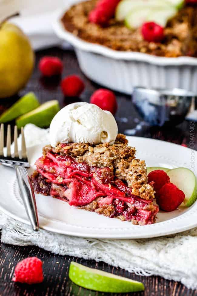 Easy Raspberry Apple Pie with Oatmeal Cookie Crumble Topping is an amazinlgy delicious twist on classic apple pie that everyone will go crazy for! I could eat the crust, filling or topping alone - every part is so good!