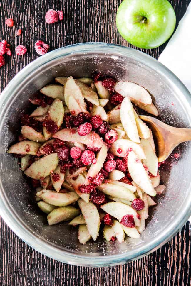 Easy Raspberry Apple Pie with Oatmeal Cookie Crumble Topping is an amazinlgy delicious twist on classic apple pie that everyone will go crazy for! I could eat the crust, filling or topping alone - every part is so good!