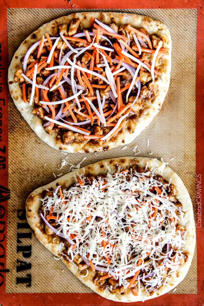 showing how to make Thai chicken pizza by adding peanut chicken, cheese, red onions and carrots