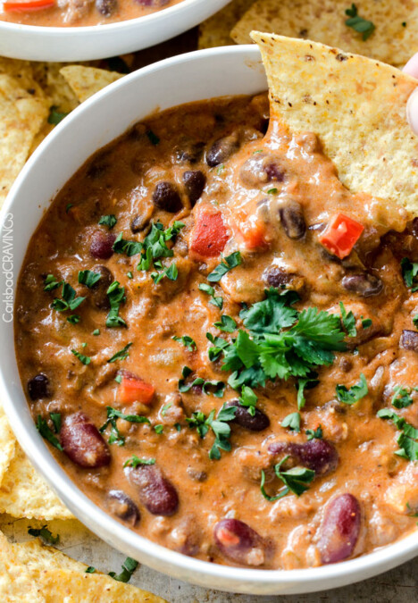 Homemade Cheesy Chili Dip or Soup is LOADED with your favorite chili ingredients, spices and SO irresistibly cheesy with NO processed cheese! Serve as a crowd pleasing appetizer or simply thin for THE most addicting soup! my favorite dip ever!