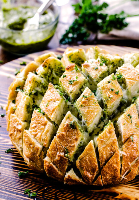 4 Ingredient, make ahead Cheesy Pull Apart Pesto Bread will make your life easier and all your parties more delicious!