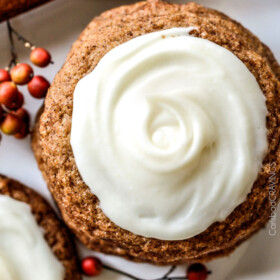 Soft and Chewy Snickerdoodle Gingersnap Cookies with Eggnog Frosting are melt in your mouth delicious infused with deep, rich molasses, ginger, cinnamon and cloves. Our favorite Christmas Cookie!