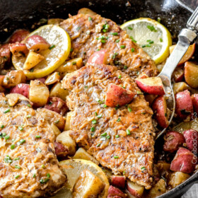 30 Minute Chicken and Potato Skillet in Creamy Lemon Paprika Sauce - quick and easy one pan meal (and one microwave dish), bursting with flavor. The potatoes finish cooking in the incredible sauce so they are SO flavorful and the crispy chicken is amazing!