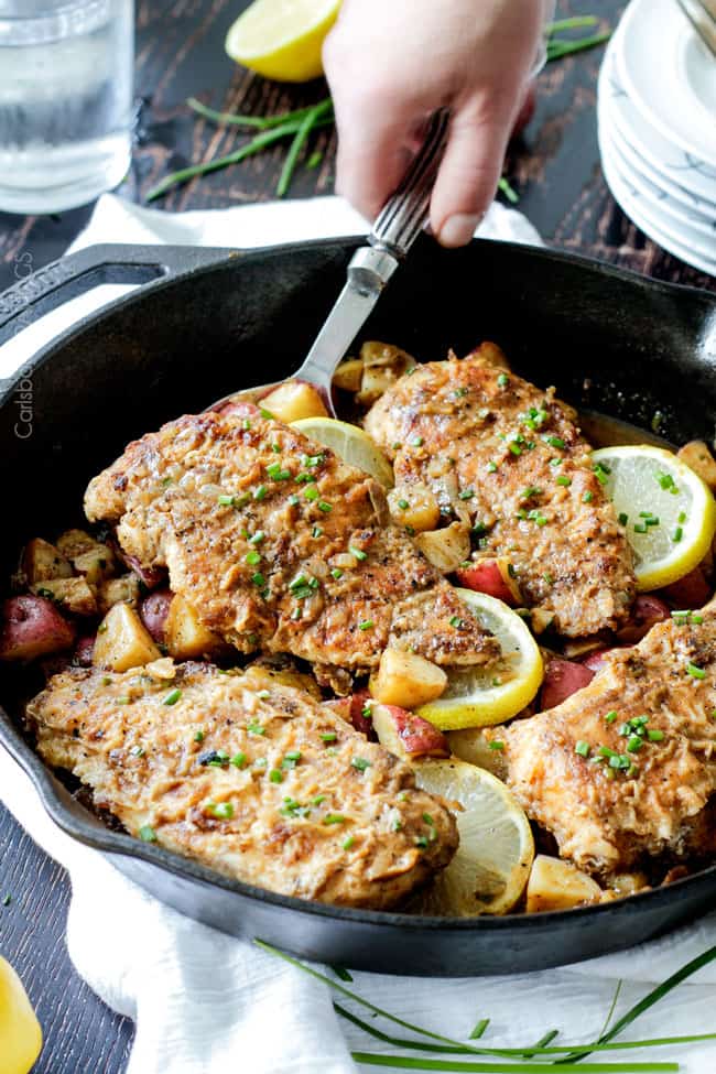 Side view of Chicken and Potato Skillet with a serving spoon getting a serving.