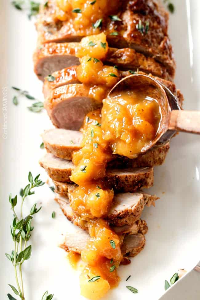 Easy, company pleasing Cajun Pork smothered in Tangy Pineapple Glaze is sweet and spicy and melt in your mouth tender! The layers of flavor or out of this world!