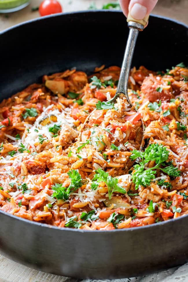 ONE POT Italian Chicken and Orzo (and veggies!) in a creamy Parmesan tomato sauce on your table in almost 30 minutes and all made in one pot! 