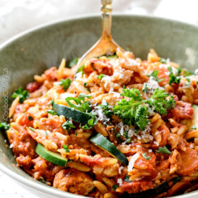 ONE POT Italian Chicken and Orzo (and veggies!) in a creamy Parmesan tomato sauce on your table in almost 30 minutes and all made in one pot!