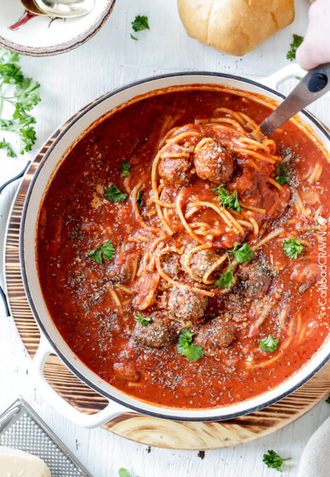 Easy One Pot Spaghetti and Meatball Soup tastes like your favorite spaghetti but is even more slurp-worthy crazy delicious! Use store bought meatballs or these incredibly moist Parmesan meatballs for a one pot meal the whole family will go crazy for!