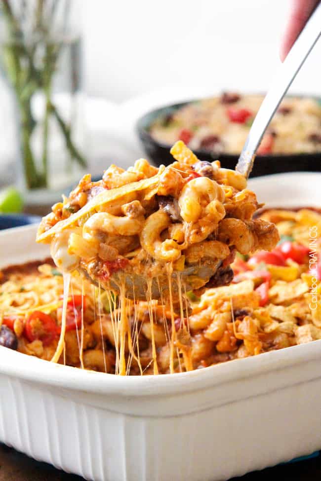 LIGHTER Cheesy Taco Pasta is my husband's absolute favorite pasta! Juicy beef, beans, pasta etc., smothered in an incredible Mexican spiced sauce is out of this world delicious! Your whole family will LOVE this and its super easy!