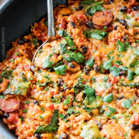20 MINUTE Tex-Mex Sausage and Rice Skillet is quick, delicious and bursting with flavor from the most amazing Creamy Roasted Red Pepper Jalapeno Sauce for a hearty, comforting one pot meal the whole family will love!