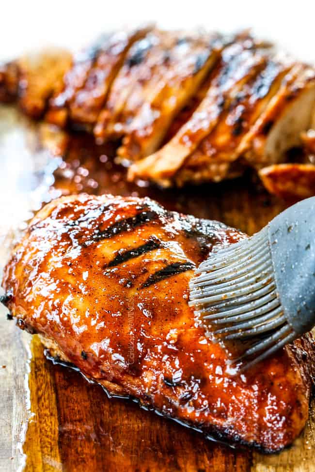 glazing Buffalo Chicken with hot sauce