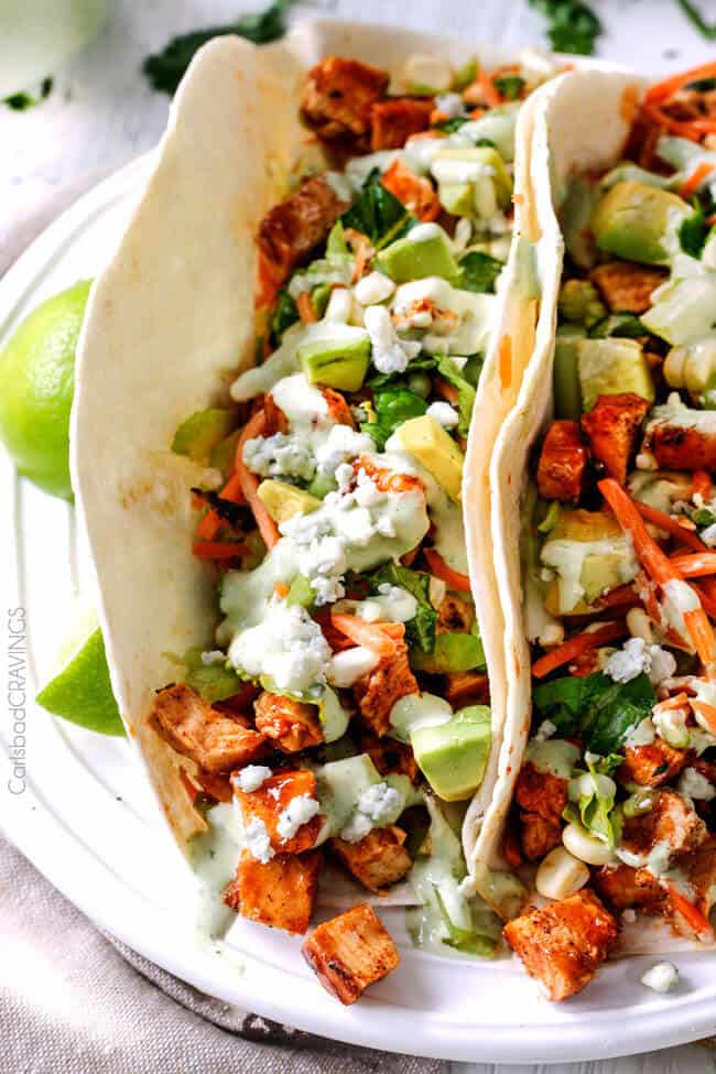 Buffalo Chicken Tacos are bursting with flavor from the incredible chicken and the Blue Cheese Cilantro Ranch is to die for! Always a crowd pleaser!