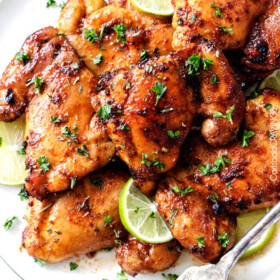 Sweet, Spicy and Tangy Honey Dijon Glazed Chicken is quick and easy and packed with flavor! The chicken thighs are rubbed in spices, cooked under the broiler for 10 minutes and glazed with the most incredible sauce!
