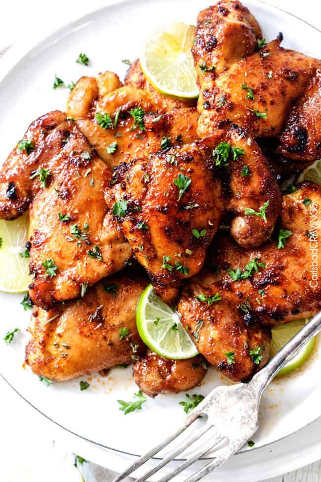 Sweet, Spicy and Tangy Honey Dijon Glazed Chicken is quick and easy and packed with flavor! The chicken thighs are rubbed in spices, cooked under the broiler for 10 minutes and glazed with the most incredible sauce!