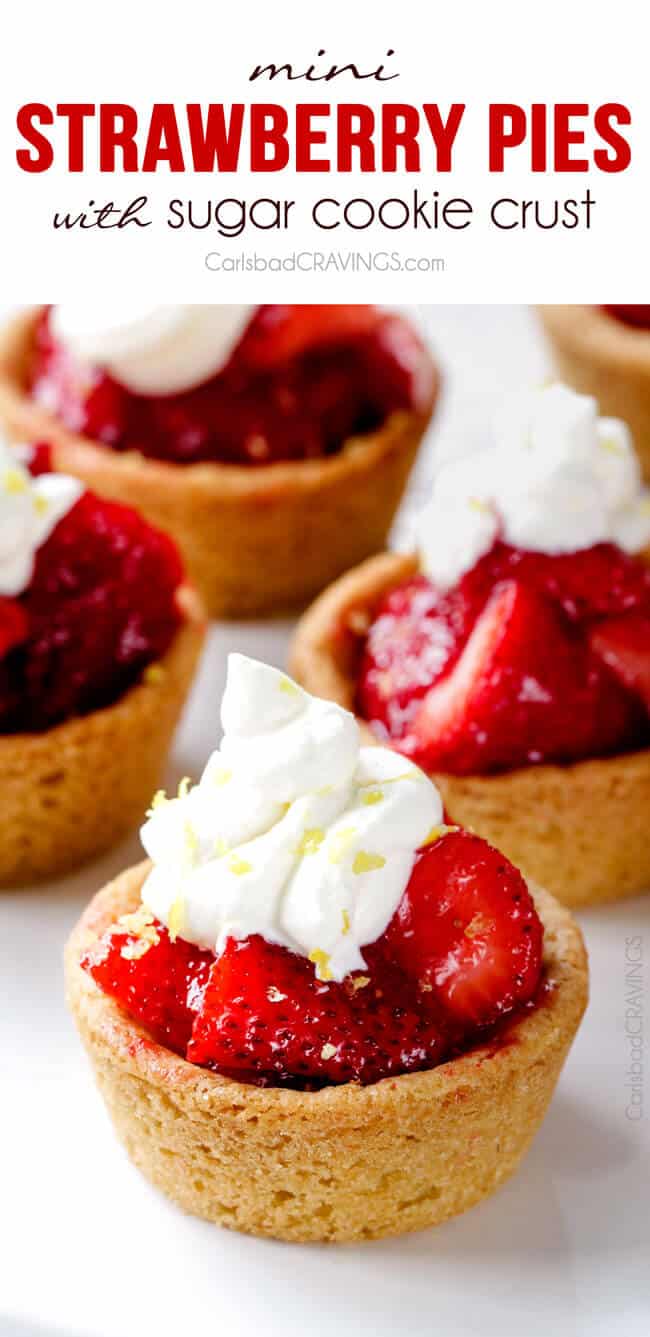 Mini Strawberry Pies with Sugar Cookie Crust with whipped cream on top.