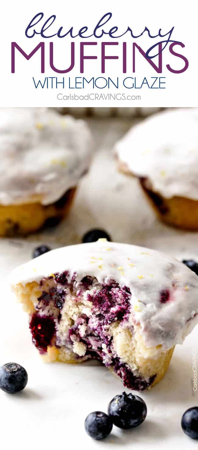 a half eaten lemon blueberry muffin bursting with blueberries on a white surface