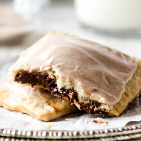Melt in-your-mouth Nutella Brown Sugar Pop Tarts cocooned in buttery, flaky pastry smothered with Cinnamon Vanilla Icing are 1000X better than store-bought and so good you will never go back to the box kind again!