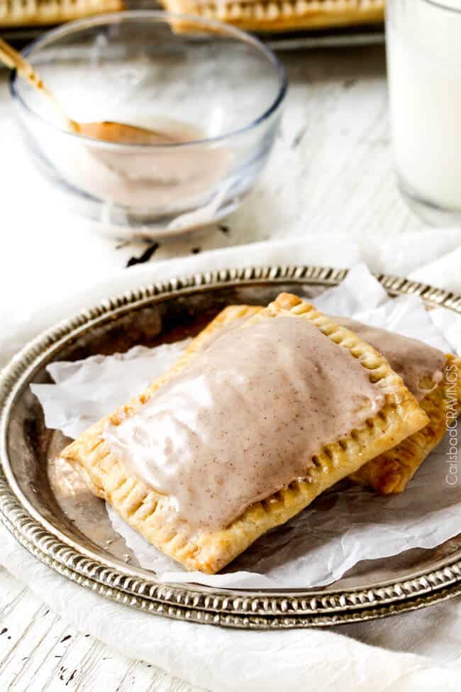 two homemade pop tarts stacked on a plate