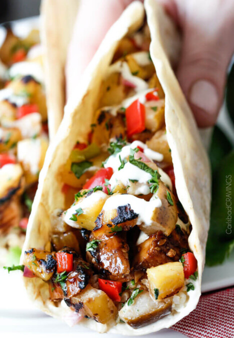 Teriyaki Chicken Tacos smothered with the BEST easy teriyaki sauce and piled with Grilled Pineapple Pear Salsa will be your new favorite taco! Company worthy but everyday easy!