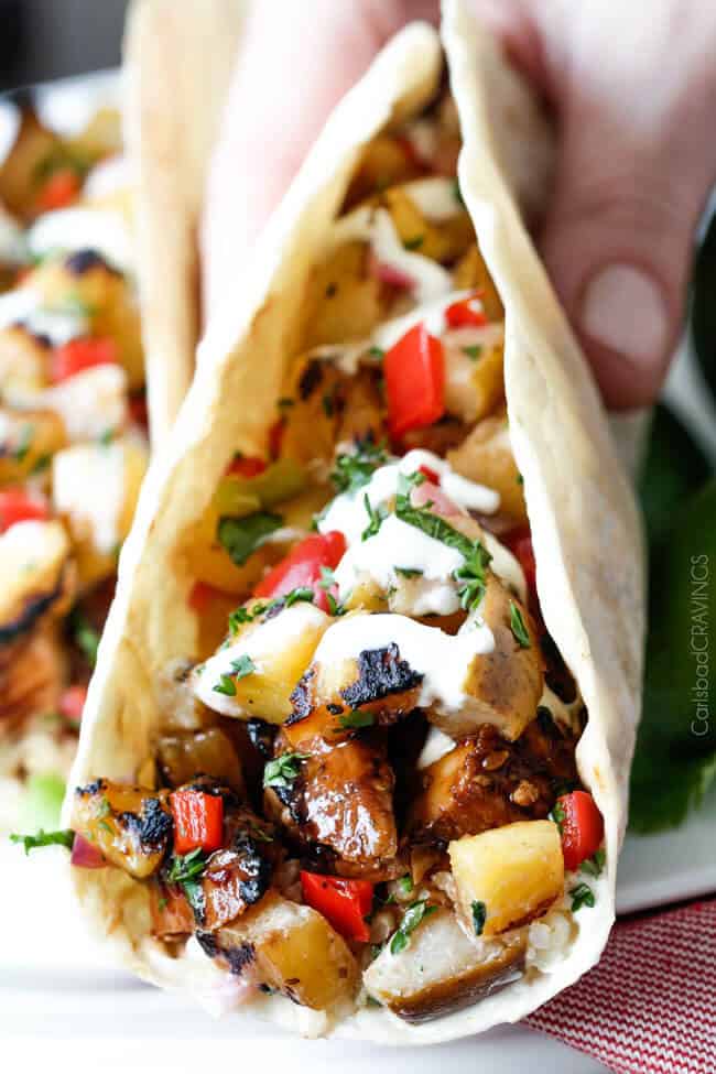 Teriyaki Chicken Tacos smothered with the BEST easy teriyaki sauce and piled with Grilled Pineapple Pear Salsa will be your new favorite taco! Company worthy but everyday easy!