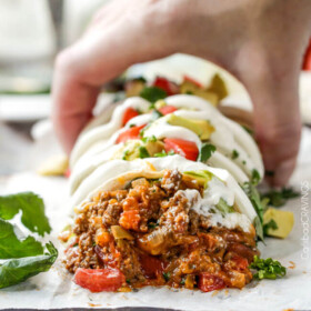 Quick, easy, comforting, inexpensive Beef and Bean Burritos stuffed with the BEST FILLING you will be eating with a spoon! #cincodemayo #30minutemeals