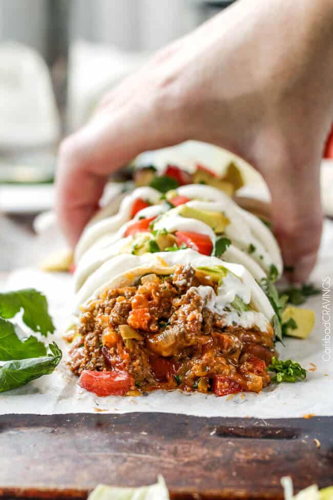 Quick, easy, comforting, inexpensive Beef and Bean Burritos stuffed with the BEST FILLING you will be eating with a spoon! #cincodemayo #30minutemeals