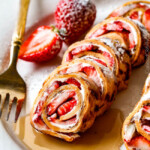These French Toast Pinwheels are the cutest, tastiest thing ever and way easier than traditional French Toast roll ups! I made them for a brunch and everyone loved them!