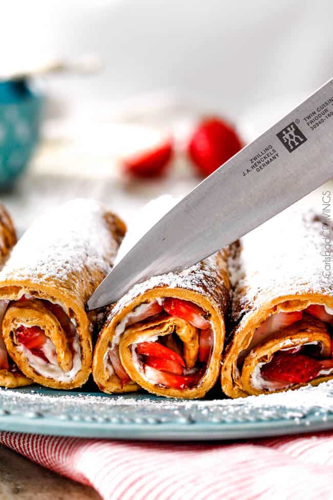 Cuting Flatbread French Toast Roll Ups or French Toast Pinwheels into servings.