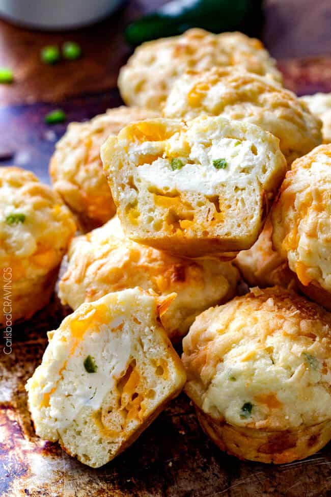 Jalapeno Popper Cheese Muffins cut in half to show the filling and layers. 