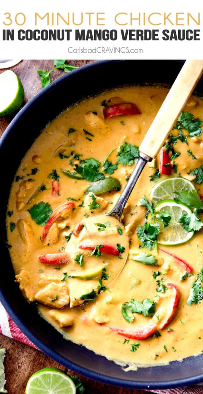 Chicken in Coconut Mango Verde Sauce in a pan with a serving spoon. 