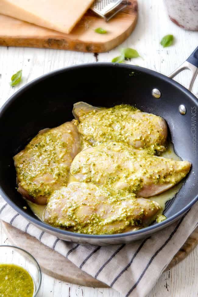 Creamy Parmesan Pesto Chicken Skillet - this is the BEST one skillet Chicken! the chicken is rubbed in pesto/Parmesan for amazing flavor and the sauce is the creamiest, most flavorful, all done in 30 minutes! I love mine with pasta, my husband loves his with potatoes! 