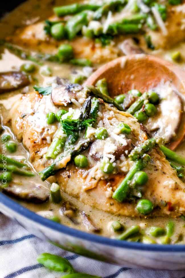 Creamy Parmesan Pesto Chicken Skillet - this is the BEST one skillet Chicken! the chicken is rubbed in pesto/Parmesan for amazing flavor and the sauce is the creamiest, most flavorful, all done in 30 minutes! I love mine with pasta, my husband loves his with potatoes! 