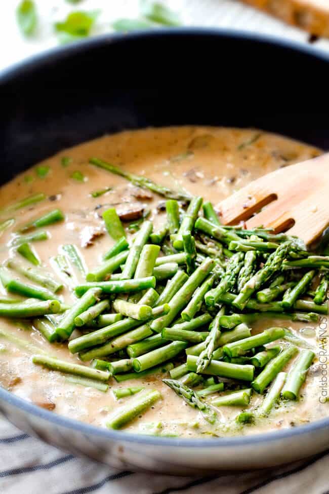 Creamy Parmesan Pesto Chicken Skillet - this is the BEST one skillet Chicken! the chicken is rubbed in pesto/Parmesan for amazing flavor and the sauce is the creamiest, most flavorful, all done in 30 minutes! I love mine with pasta, my husband loves his with potatoes! 