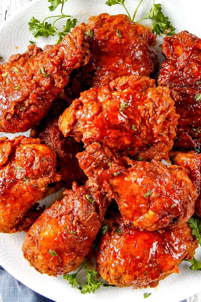 overhead view of nashville fried chicken on white plate