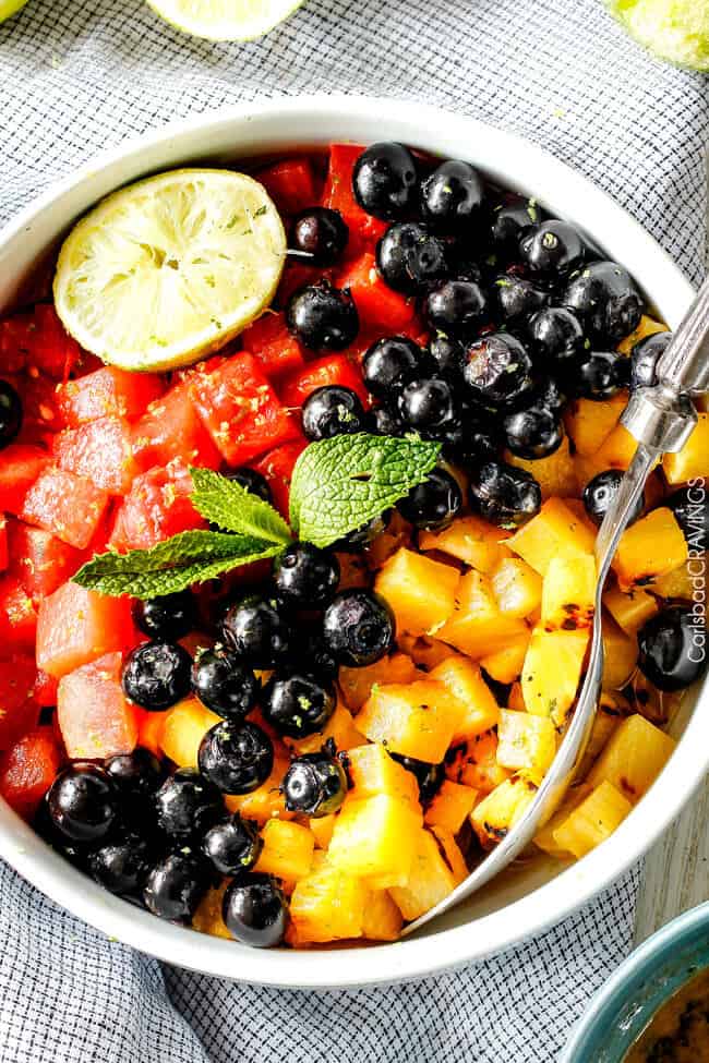 top view of easy summer fruit salad with watermelon, pineapple, blueberries
