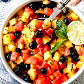 (Grilled optional) Watermelon Pineapple Summer Salad with Honey Lime Mint Dressing - This is possibly the best fruit salad I have ever had the pleasure of making and its so easy! I’m asked all the time to bring it get-togethers and what I especially love is you can use any fruit you want. One of my go to summer recipes!