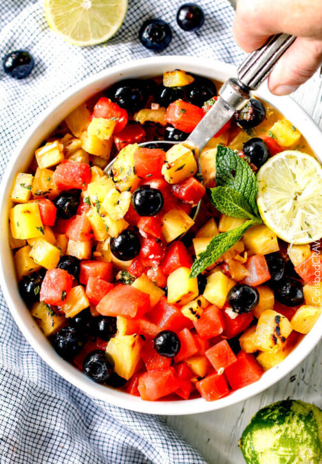 (Grilled optional) Watermelon Pineapple Summer Salad with Honey Lime Mint Dressing - This is possibly the best fruit salad I have ever had the pleasure of making and its so easy! I’m asked all the time to bring it get-togethers and what I especially love is you can use any fruit you want. One of my go to summer recipes!