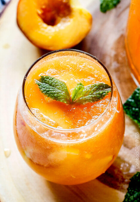 Sparkling Peach Punch (non alcoholic) - vibrant, refreshing, flavorful and the perfect amount of slush! I love making this for baby/bridal showers and potlucks and everyone else loves it too!