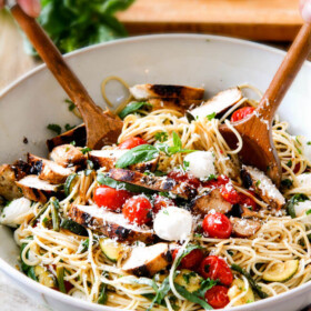 Caprese Chicken Pasta - this is my new favorite! the balsamic chicken is to die for and the roasted vegetables are so fresh and flavorful! The freshly grated Parmesan and Mozzarella push this over the edge - SOOO GOOD a MUST try!