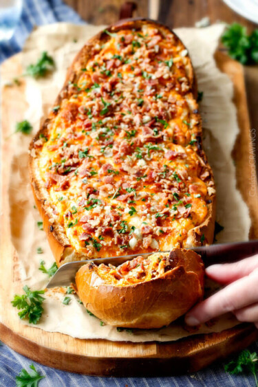 Baked Buffalo Chicken Dip (Stuffed French Bread) - Carlsbad Cravings
