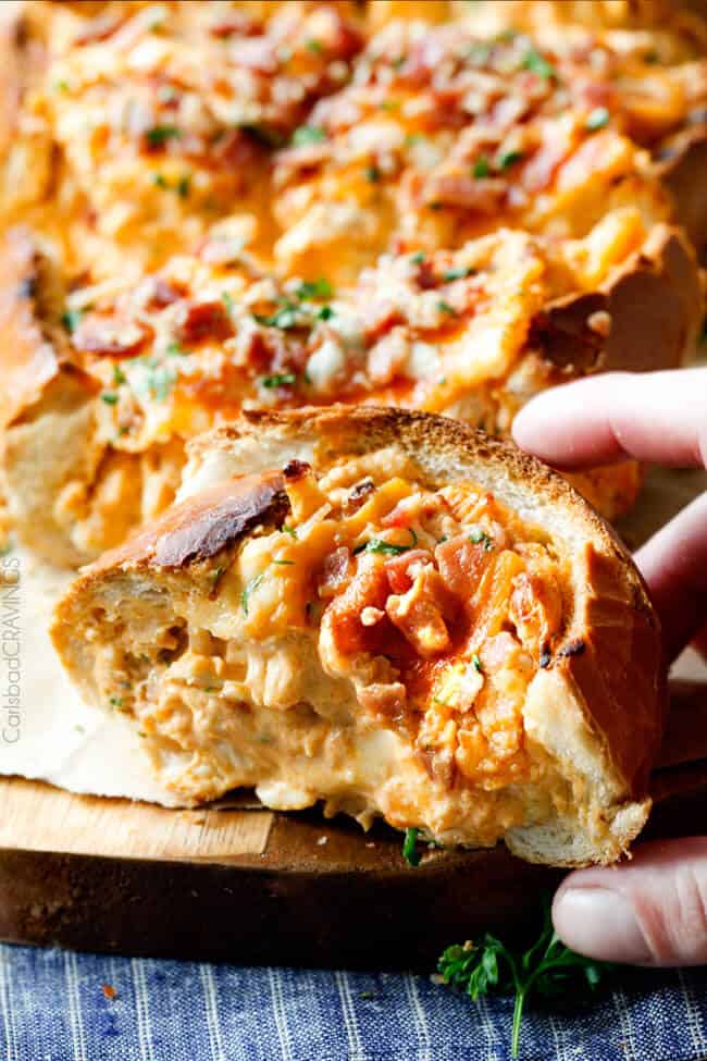 A close up of a piece of Buffalo Chicken Dip (Stuffed French Bread)