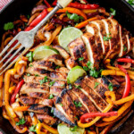 easy Skillet Chicken Fajitas - these are the BEST chicken fajitas! the marinade is seriously the best I've ever tried - better than any restaurant! My family LOVES these this filling so much we also use it for filling in burritos, enchiladas and salads!