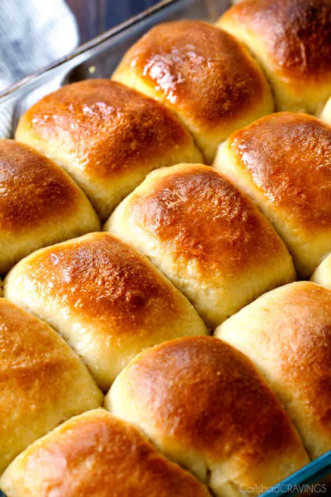A close up of soft buttery Hawaiian Sweet Rolls baked in a pan.
