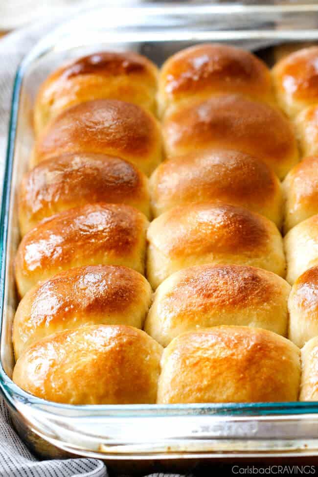 Showing fresh baked Hawaiian Sweet Rolls baked in a pan.