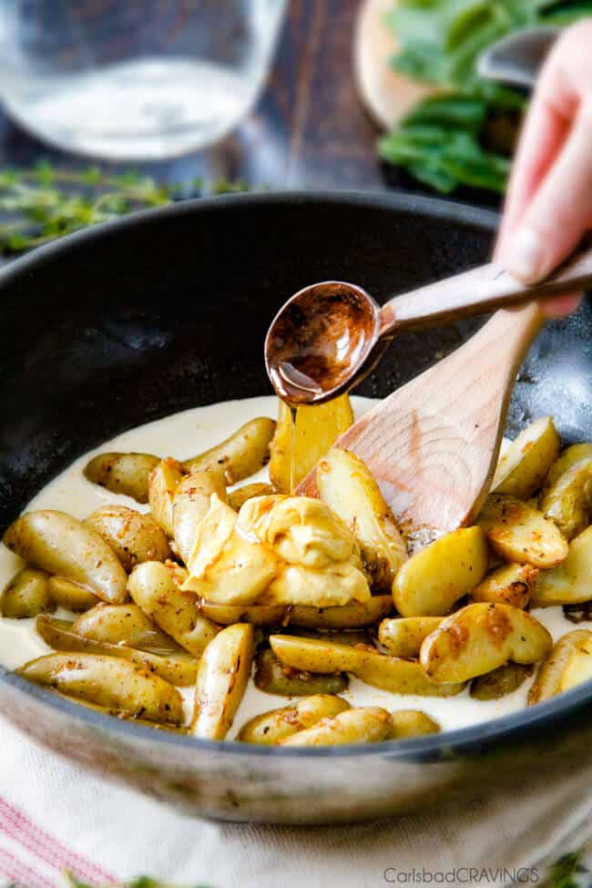 Showing how to make Maple Dijon Chicken Skillet cooking Fingerling Potatoes.