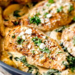 30 Minute Maple Dijon Chicken Skillet with Fingerling Potatoes and Spinach - this super easy, flavorful one chicken skillet is a meal all in one and is my favorite go-to weeknight meal! My kids love that it has potatoes in it and the creamy maple Dijon sauce is incredible!